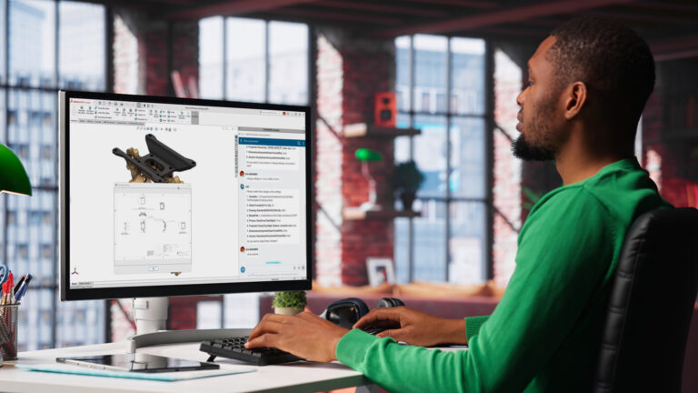 SOLIDWORKS AI being used by an engineer to generate drawings and review CAD design workflows in SOLIDWORKS